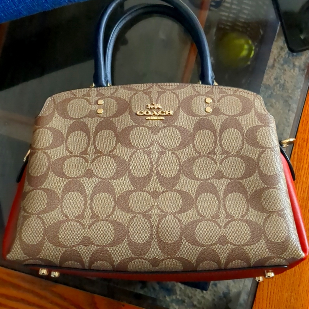 Coached purse